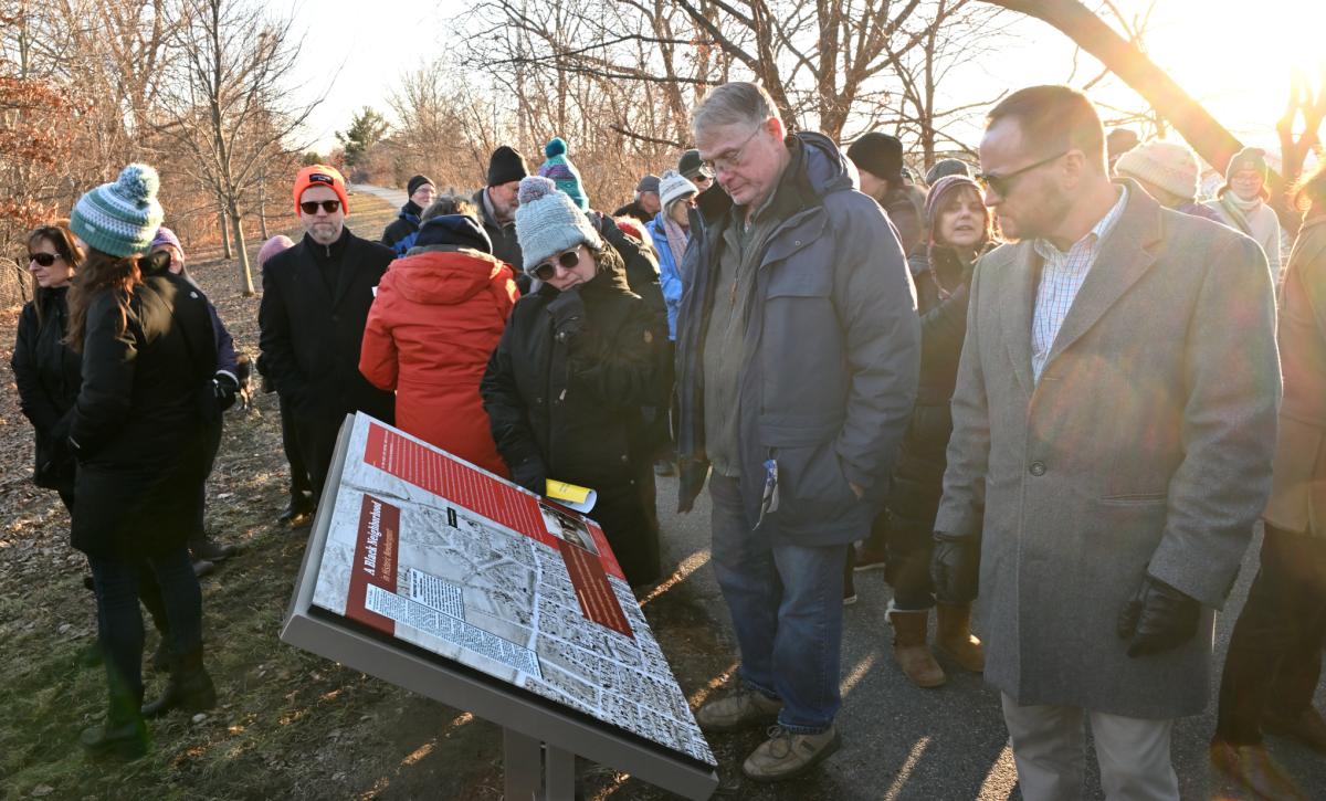 People viewing first sign 2/1/2023 by Bob Watts
