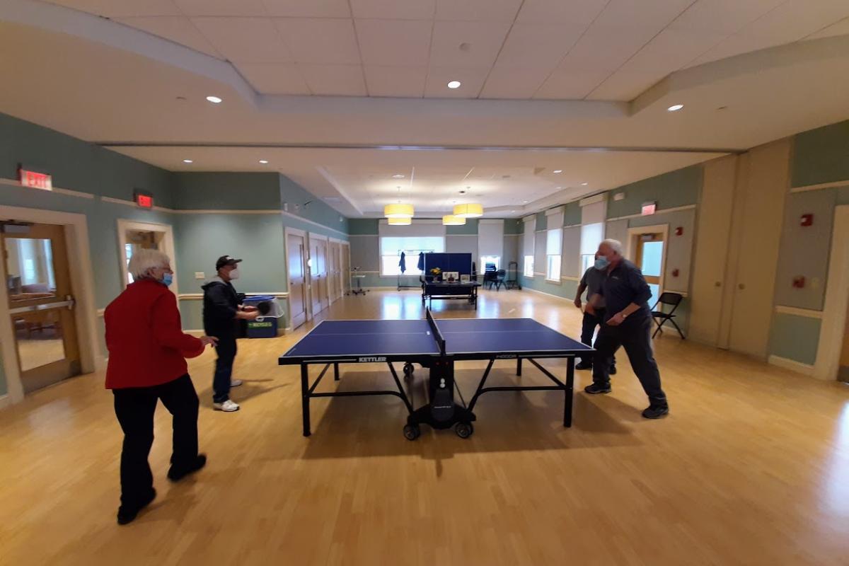 Ping pong players compete in a casual game